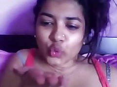 indian teen playing on her webcam